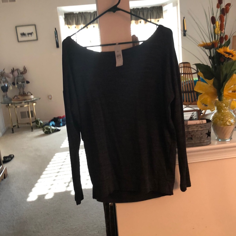 Brand new never worn open back long sleeve